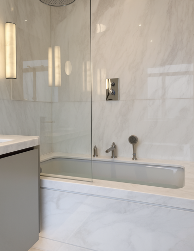 Bianco Rhino marble bath surround and wall cladding Marylebone London by Marble Bros LTD