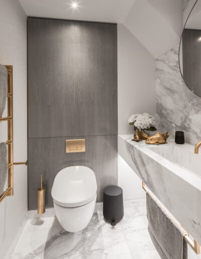 Luxury bathroom with Volakas marble flooring and bespoke marble vanity – Montpelier Square London project by Rigby & Rigby