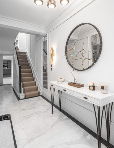 Luxury entrance hallway with bookmatched Calacatta marble floor and Pietra Grey border – Montpelier Square London project by Rigby & Rigby, stone installation by Marble Bros LTD