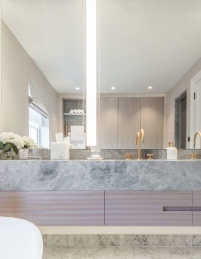 Luxury bathroom with Silver Emperador marble vanity and Carrara Venatino marble floor – Montpelier Square London project by Rigby & Rigby